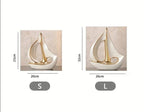 Decorative sailboat sculpture