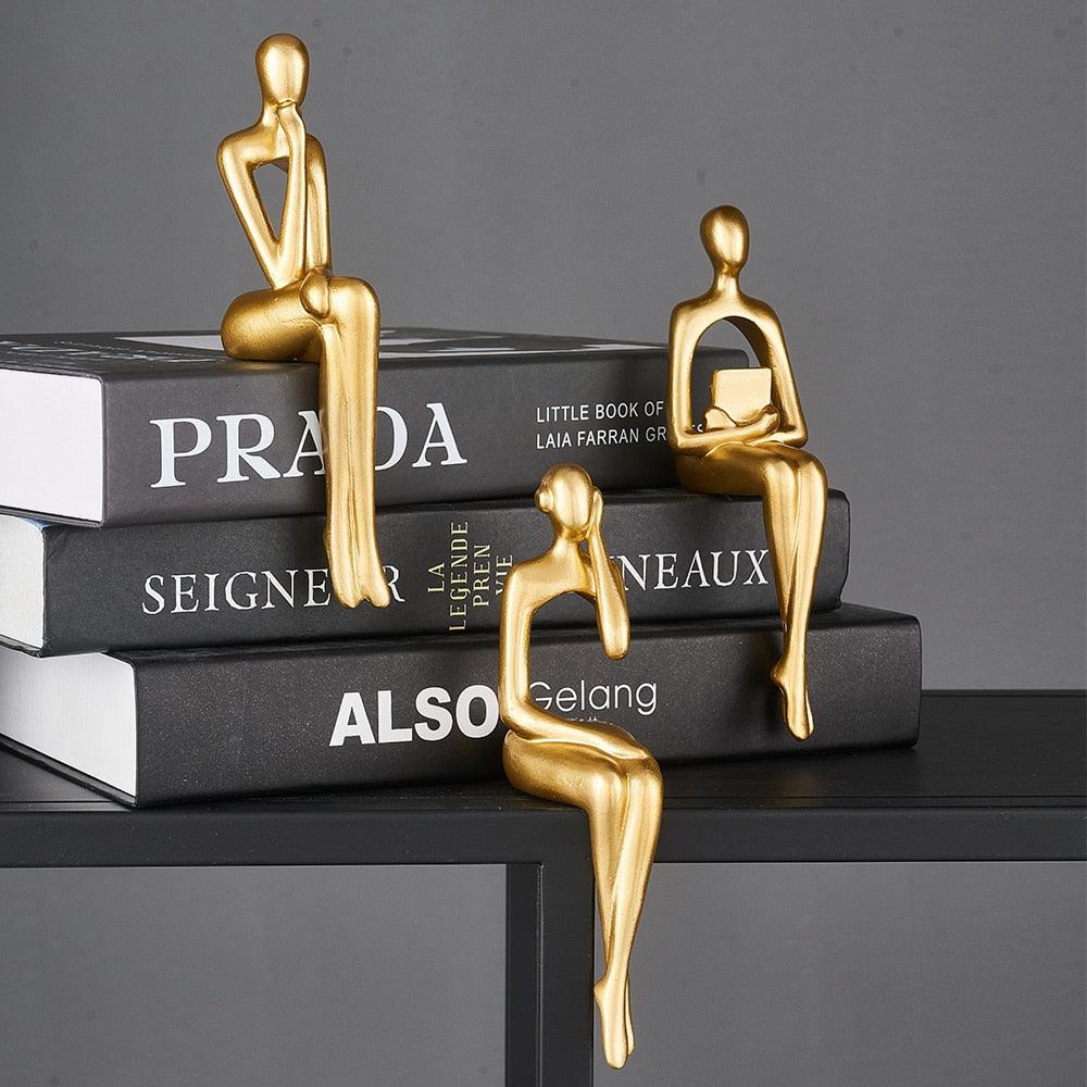 Trio nordico di sculture umane