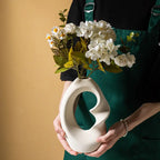 Vase double courbée en céramique