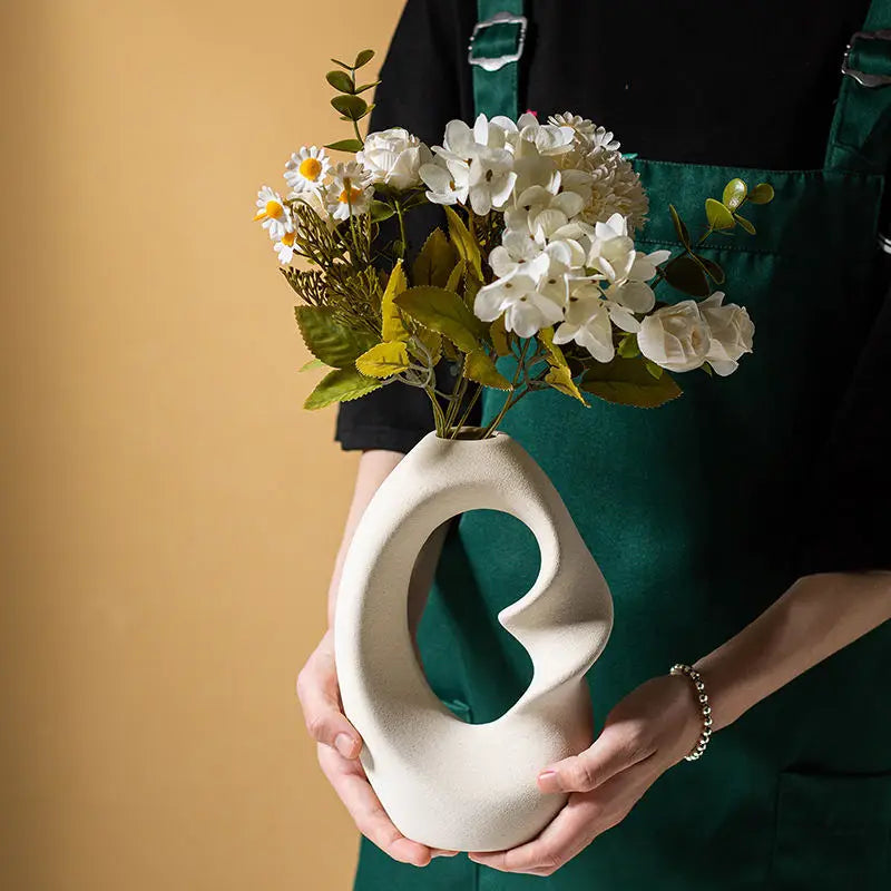 Curved double vase made of ceramic