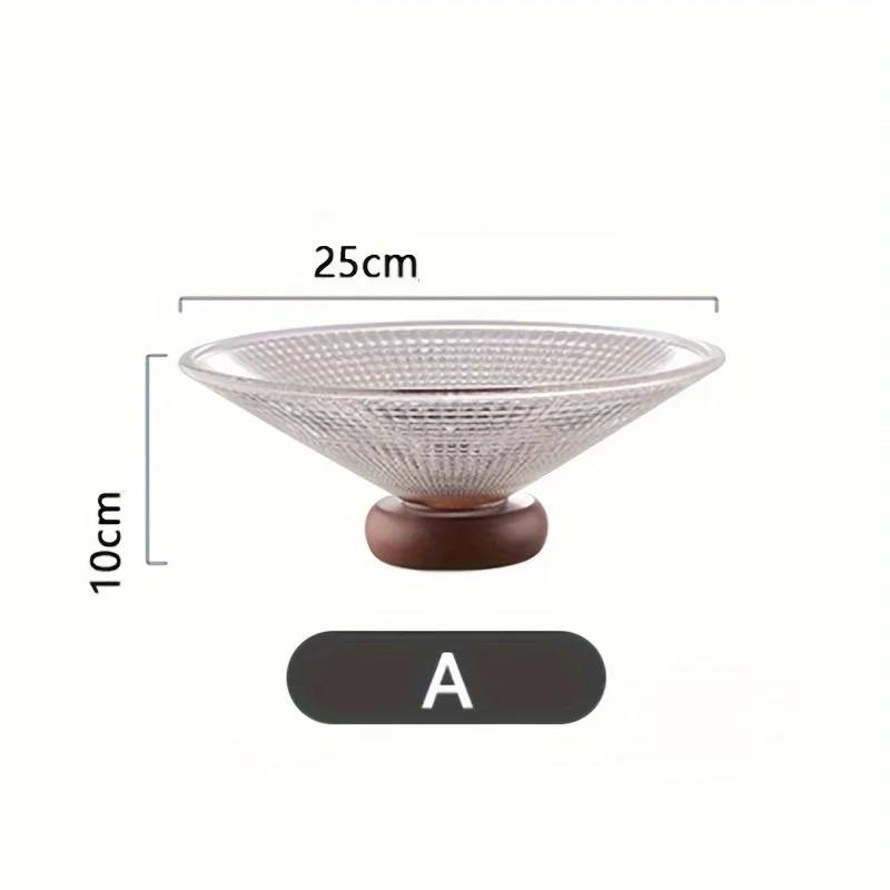 Fruit bowl made of glass with wooden base