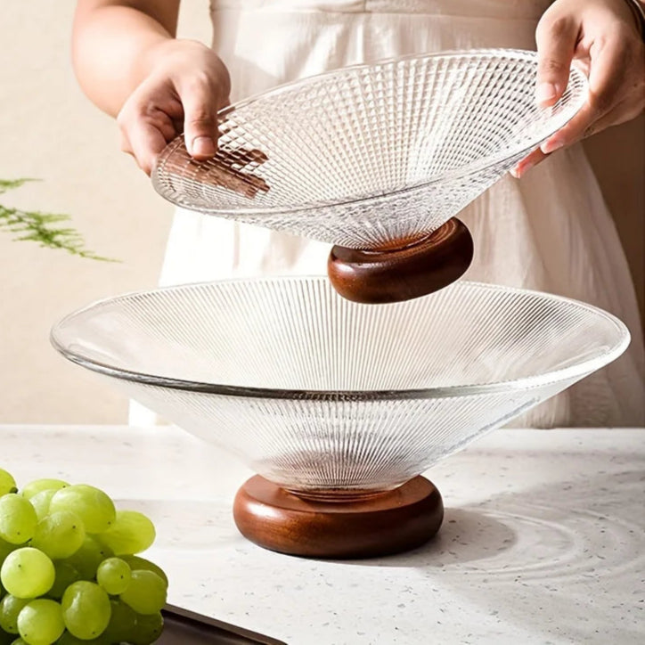 Fruit bowl made of glass with wooden base