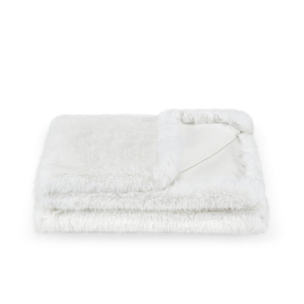 Kuscheldecke aus Kunstfell Weiss – Nivis