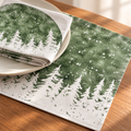Platzsets mit Servietten für Weihnachten aus bedrucktem Leinen – Tannensilhouetten